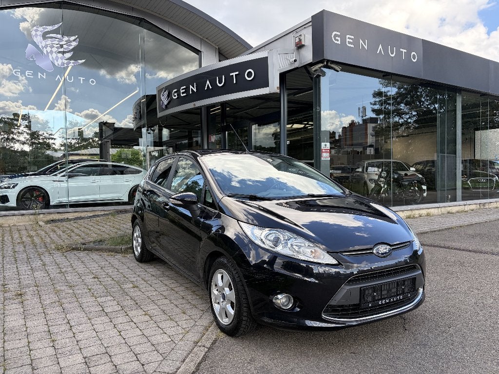 Ford Fiesta 1.6 TDCi Titanium ECOnetic * 12 MAANDEN GARANTIE, Auto's, Voorwielaandrijving, Stof, Zwart, 4 cilinders
