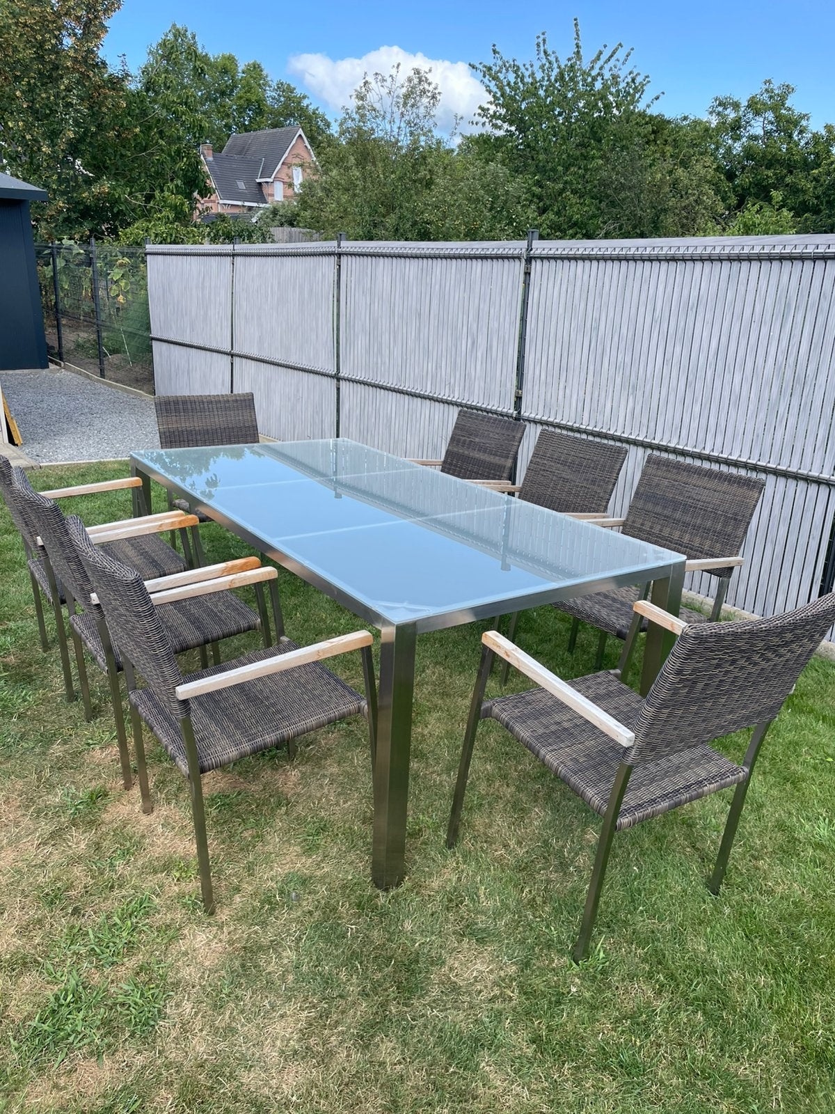 Rvs tafel met glazenblad + 8 stoelen + 8 stoelkussens, Tuin en Terras, Tuinsets en Loungesets, Ophalen, Gebruikt, 8 zitplaatsen