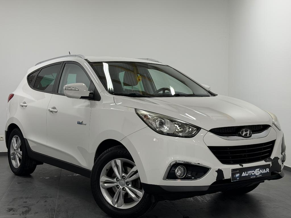 Hyundai iX35 1.6i 2WD Navi - Camera - Airco, Auto's, Voorwielaandrijving, Euro 5, Monovolume, Zwart