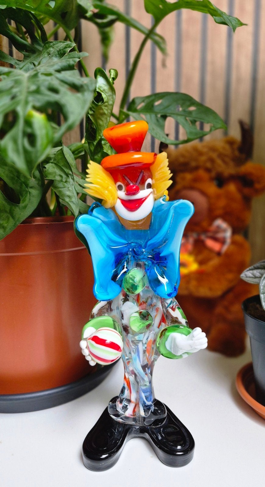 murano clown glas, Ophalen