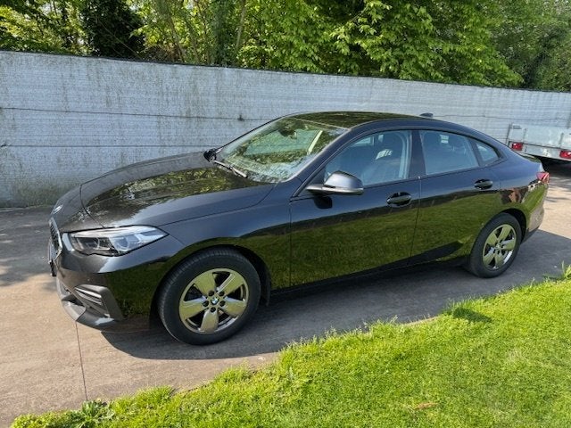 Bmw 218IA Benzine Euro 6 Bj. 6/2021 met 70000km, Auto's, Automaat, Dealer onderhouden, Zwart, Leder