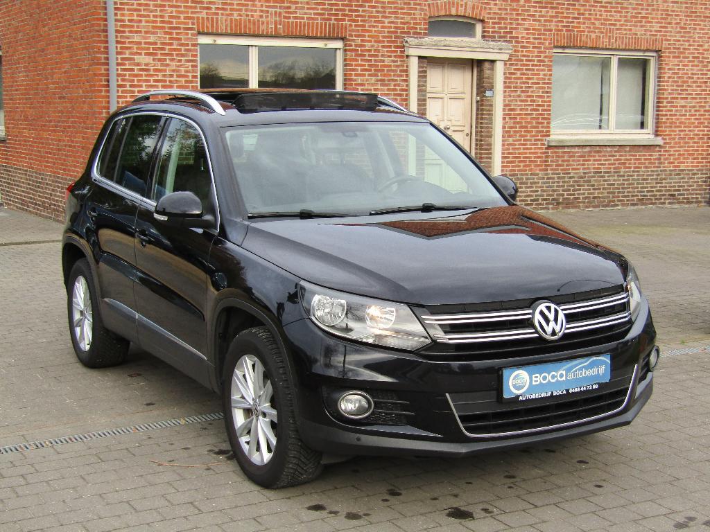 Vw Tiguan 1.4 TSI, Auto's, Volkswagen, Euro 5, 4 cilinders, Zwart, Leder