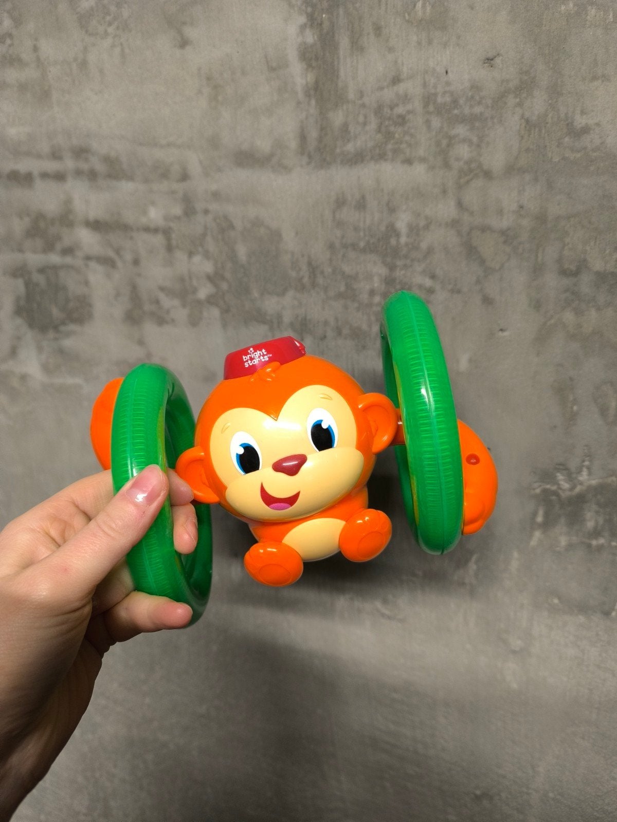 Baby speeltje roll & glow monkey - Bright Starts, Enlèvement ou Envoi, Comme neuf, 6 mois à 2 ans