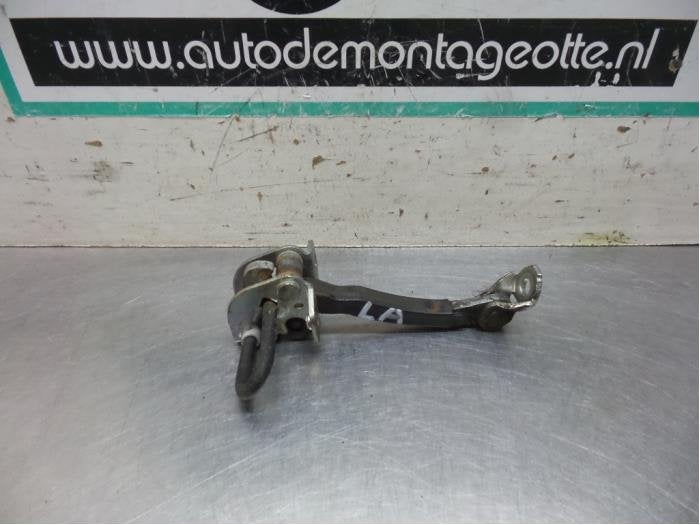 Butée 4portes arrière gauche d'un Fiat Punto Grande, -, Utilisé, Fiat, -
