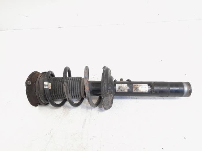 Schokdemper links-voor van een Volkswagen Tiguan, Gebruikt, -, Volkswagen, -