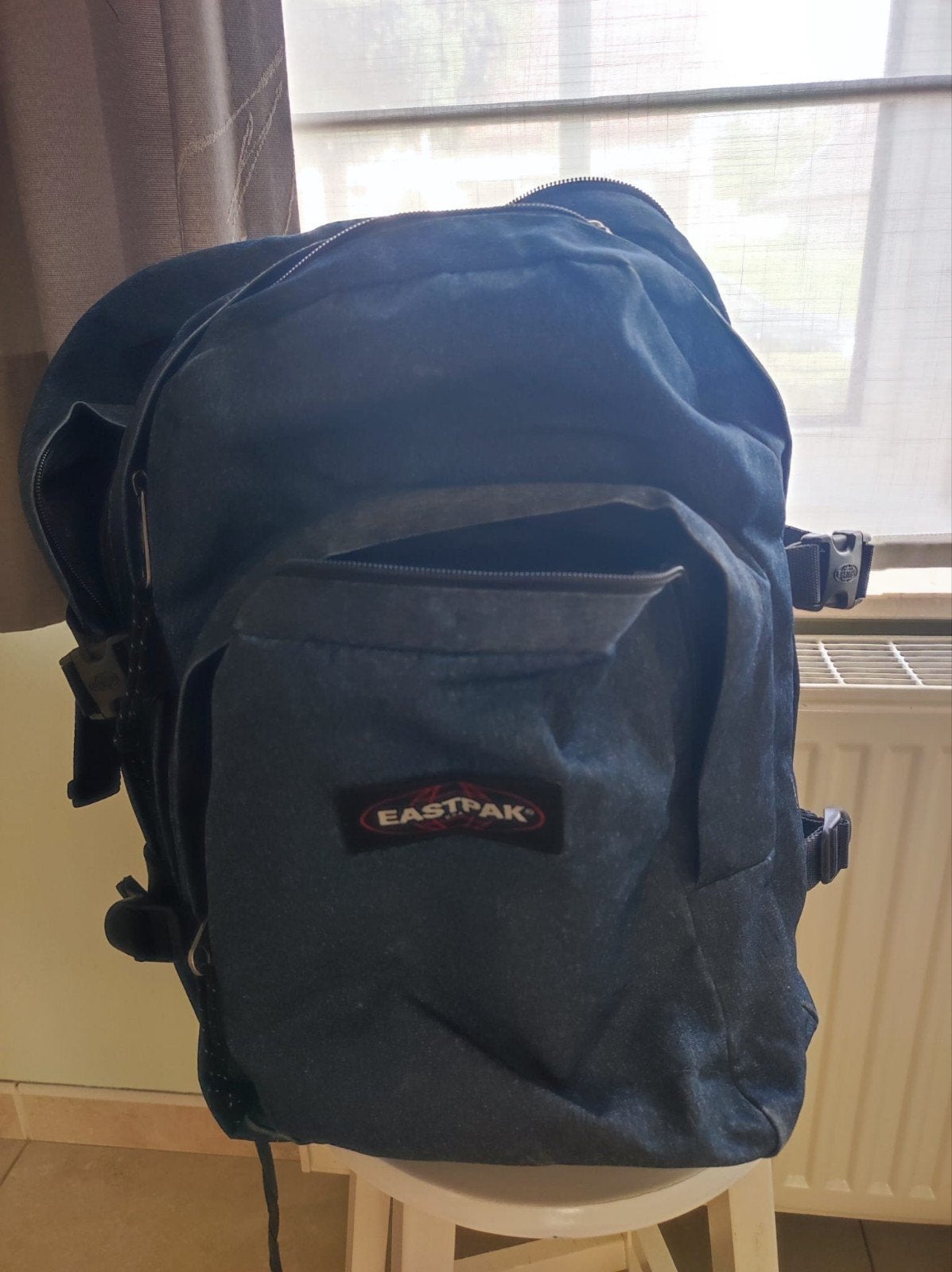 Eastpak boekentas / rugzak, Ophalen
