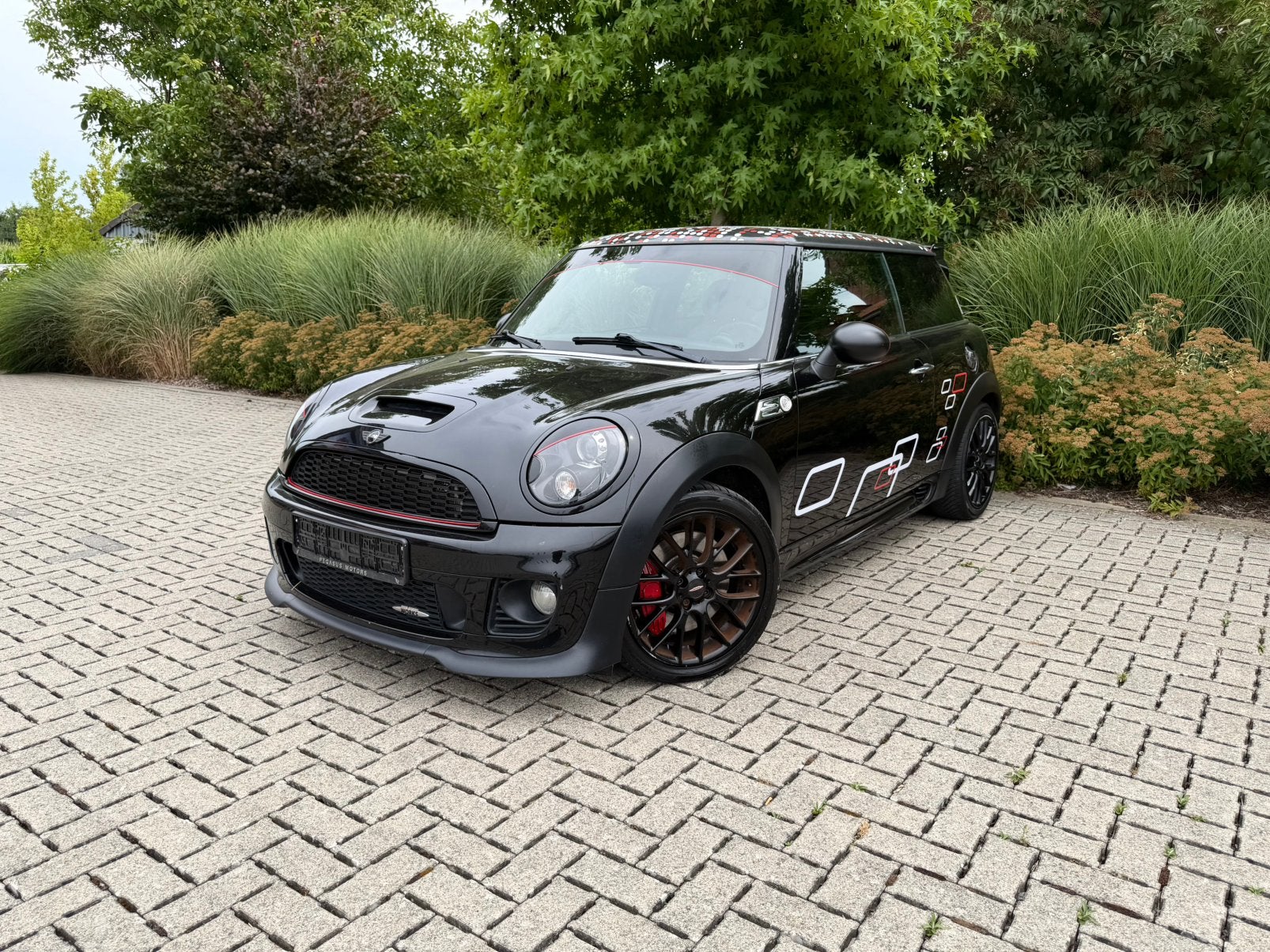 MINI John Cooper Works 1.6 • 2012|150.000km|Manueel, Euro 5, 1600 cc, Zwart, Leder