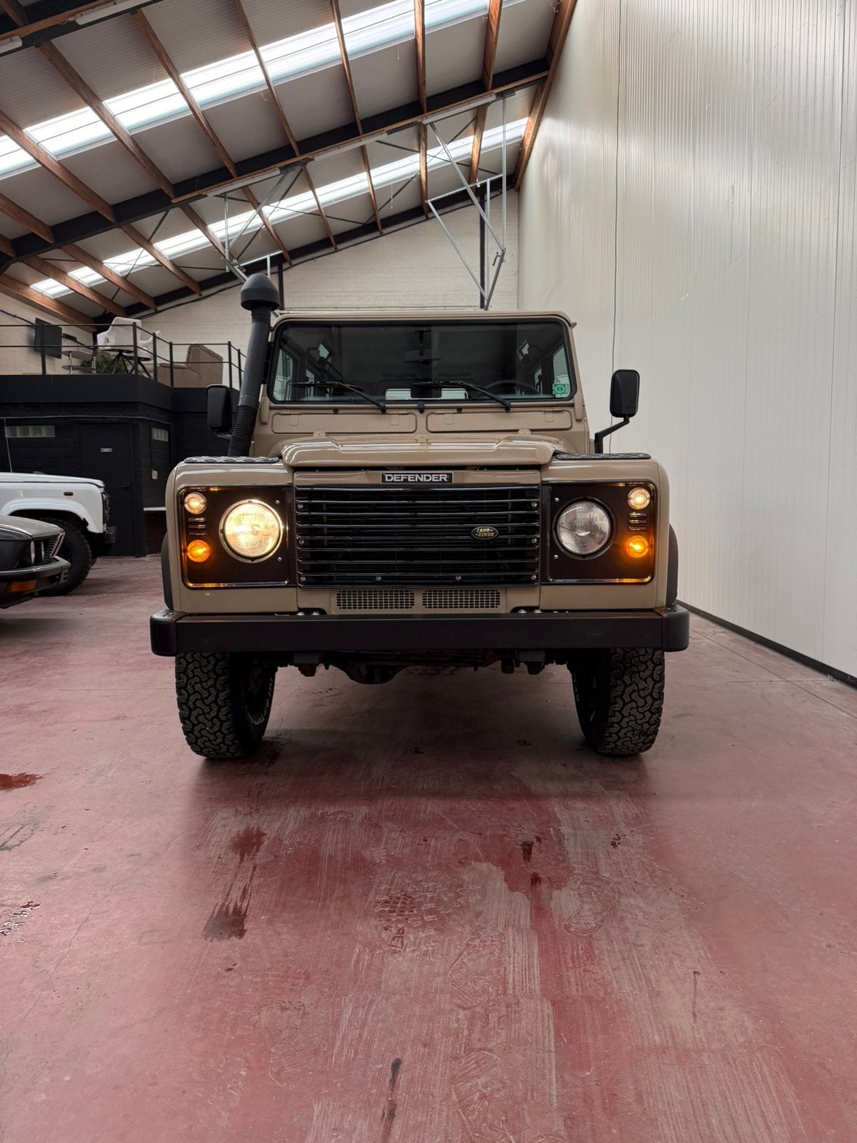 Land Rover Defender Td5 Libyan Sand, Auto's, Dealer onderhouden, Stof, Beige, Defender