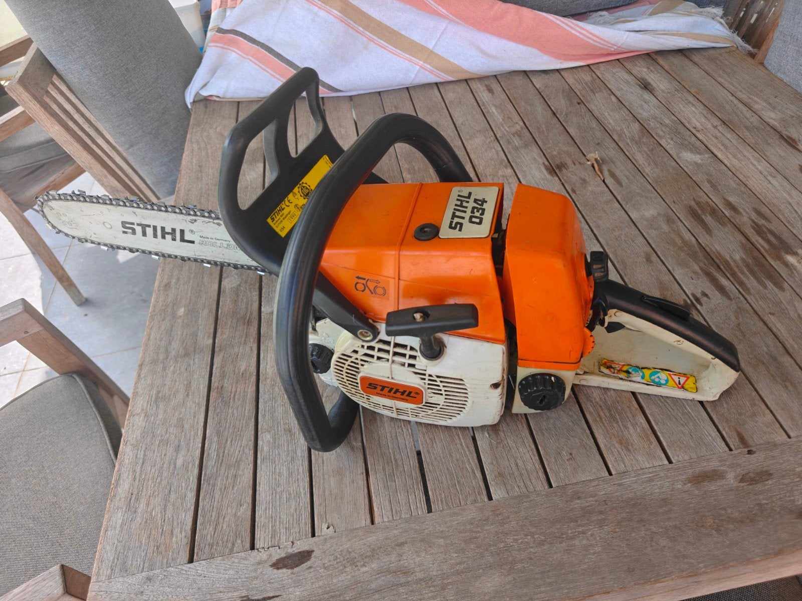 Stihl 034 kettingzaag, Ophalen