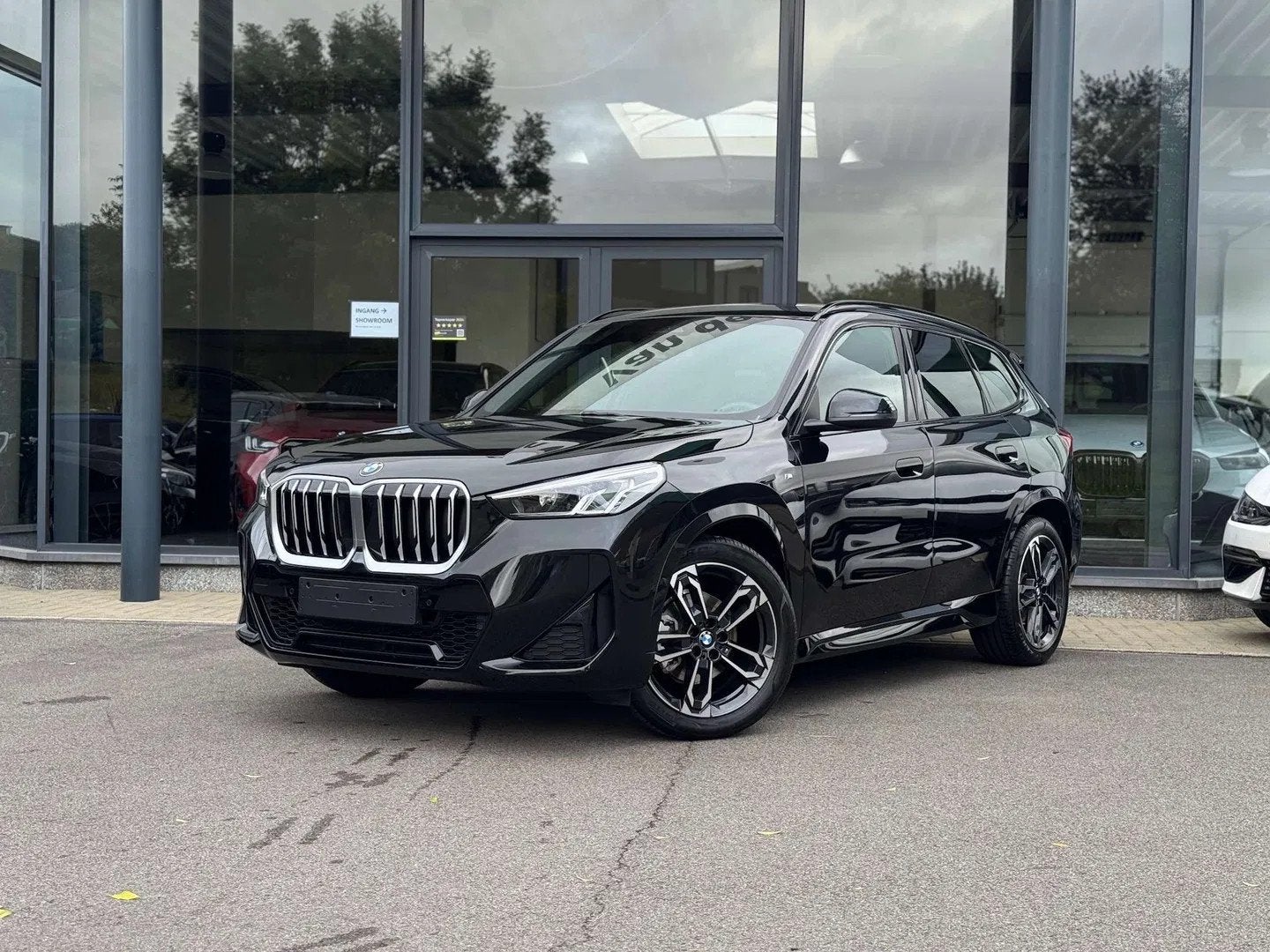 BMW X1 sDrive18i M Sport / PANODAK / TREKHAAK / DODE HOEK, Gebruikt, Zwart, 136 pk, 1 kg