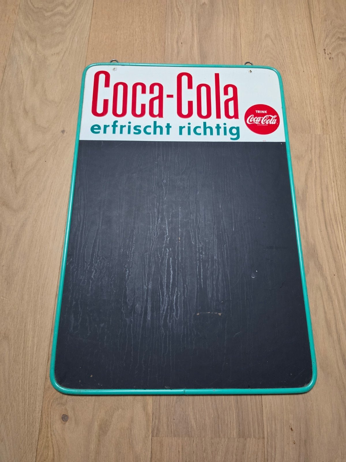 Coca cola bord, Ophalen