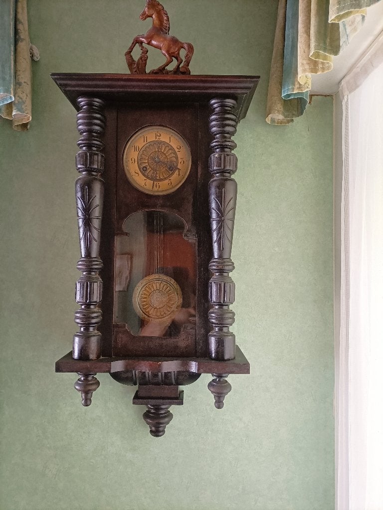 antieke klok met slinger, Ophalen