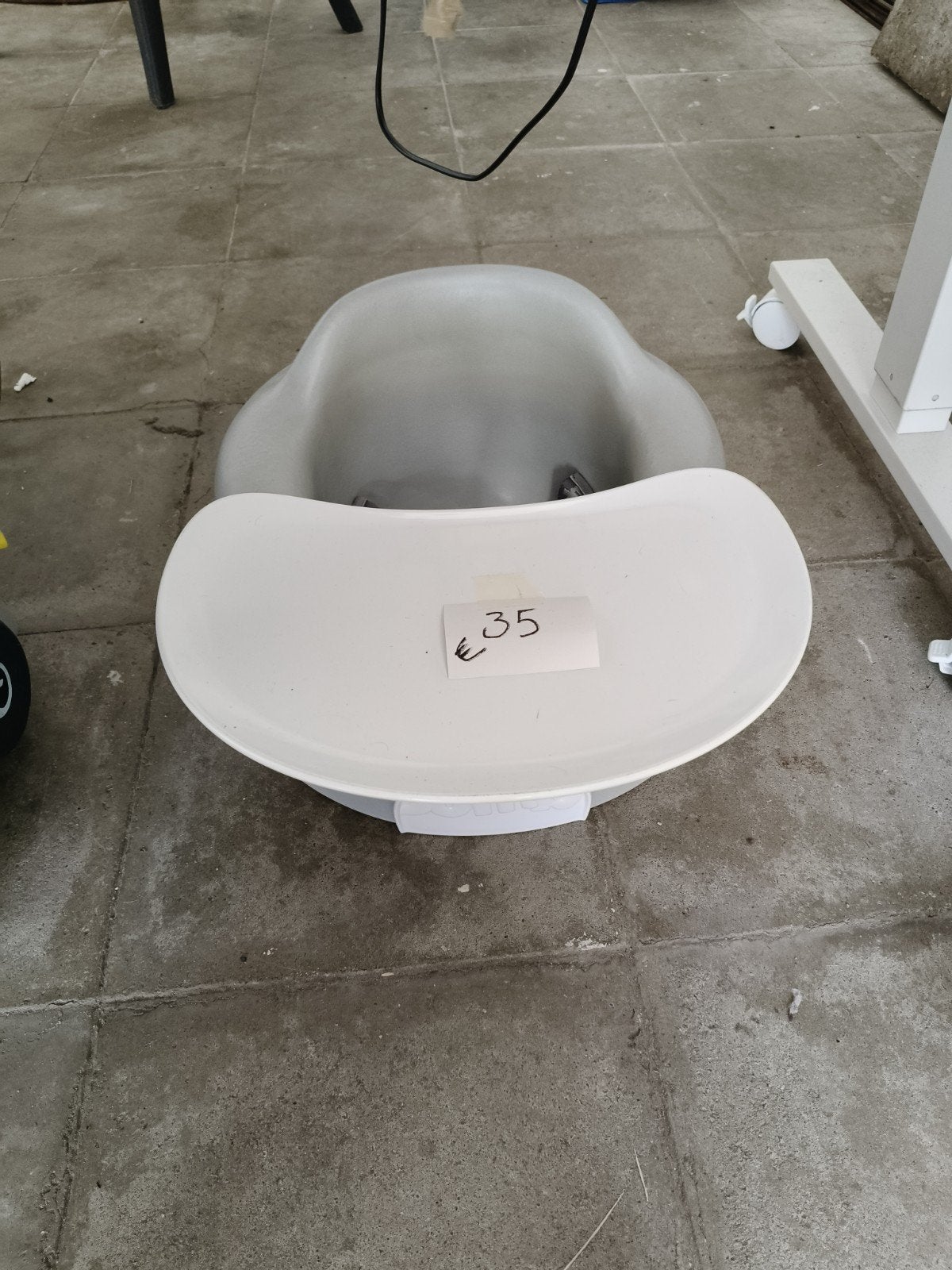 Bumbo zitje met tafeltje, Ophalen