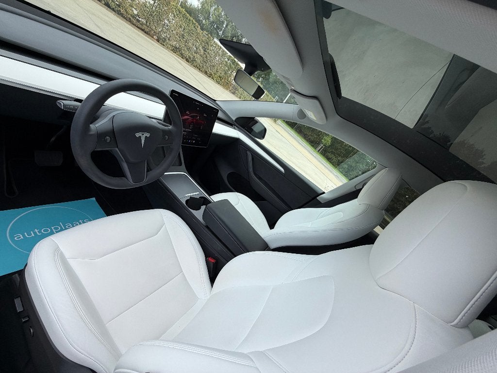 Tesla Model Y 2023 Long Range Dual Motor 39409km, Auto's, Dealer onderhouden, Euro 6, Parkeerassistent, 5 zetels