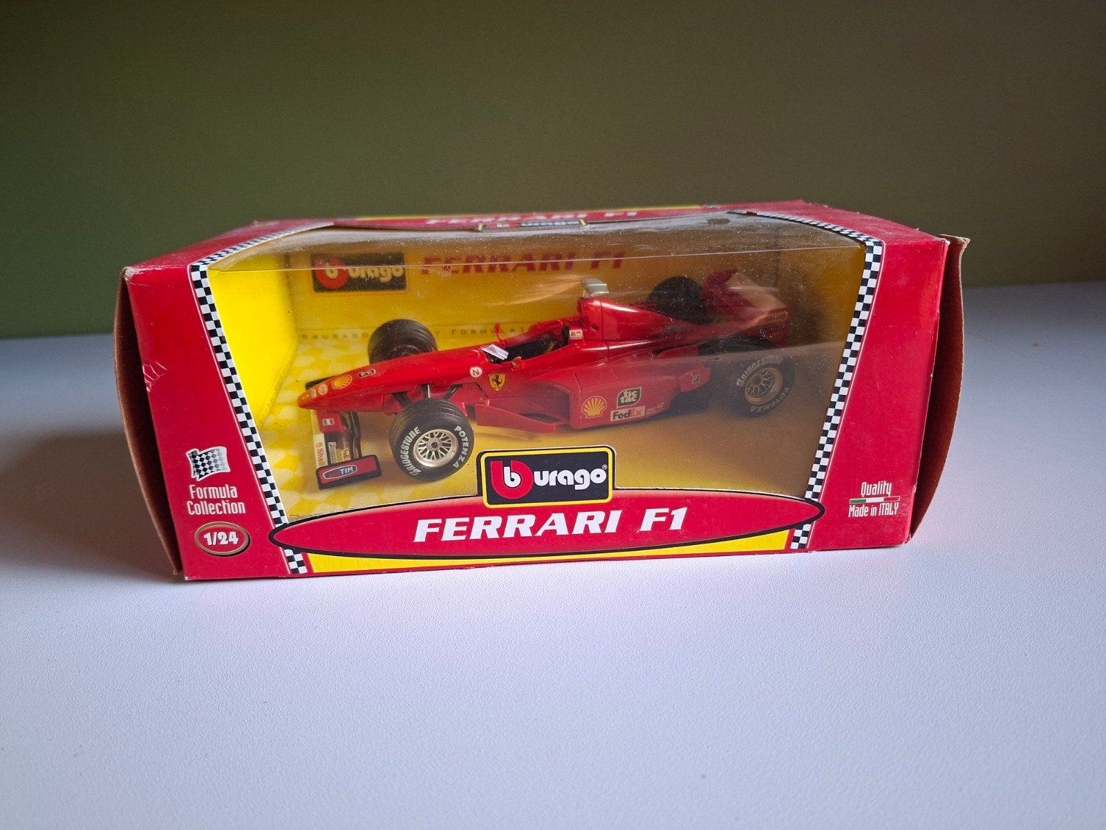 Burago Ferrari F1 à l'échelle 1:24, Enlèvement ou Envoi, Comme neuf, Voiture, Burago
