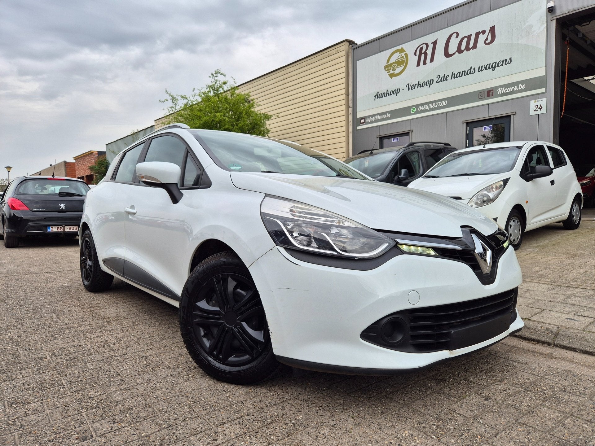 Renault Clio 1.2i Break 2013/76.000km/Airco/Navi/Topstaat! 1, Auto's, Renault, Gebruikt, Euro 6, Wit, Bedrijf