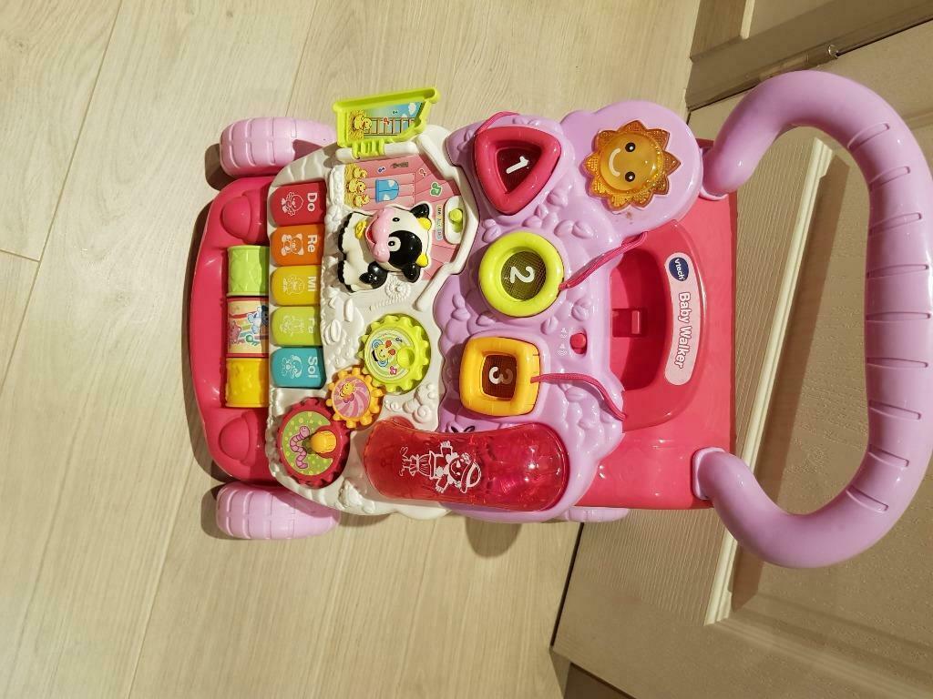 V tech loopwagentje roze, Ophalen, Zo goed als nieuw, 6 maanden tot 2 jaar