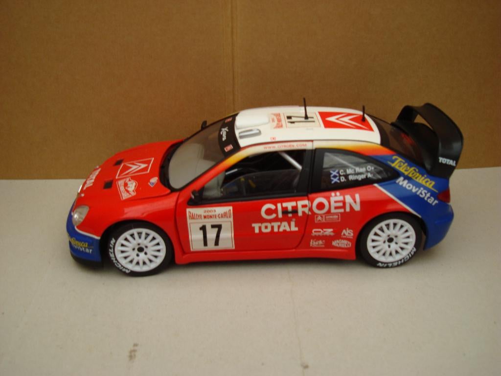 CITROEN C4 RALLY PORTRUGAL SEBASTION LOEB 1/43., Ophalen of Verzenden, Nieuw, Auto, Overige merken