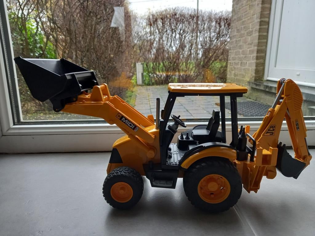 Bruder tractor met schepbak vooraan, graver achteraan, Ophalen of Verzenden