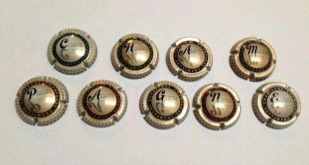 Champagne capsules reeks 799 met gouden achterzijde, Enlèvement