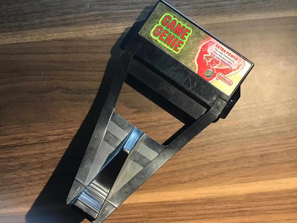 Nes game genie, Games en Spelcomputers, Ophalen of Verzenden, Gebruikt