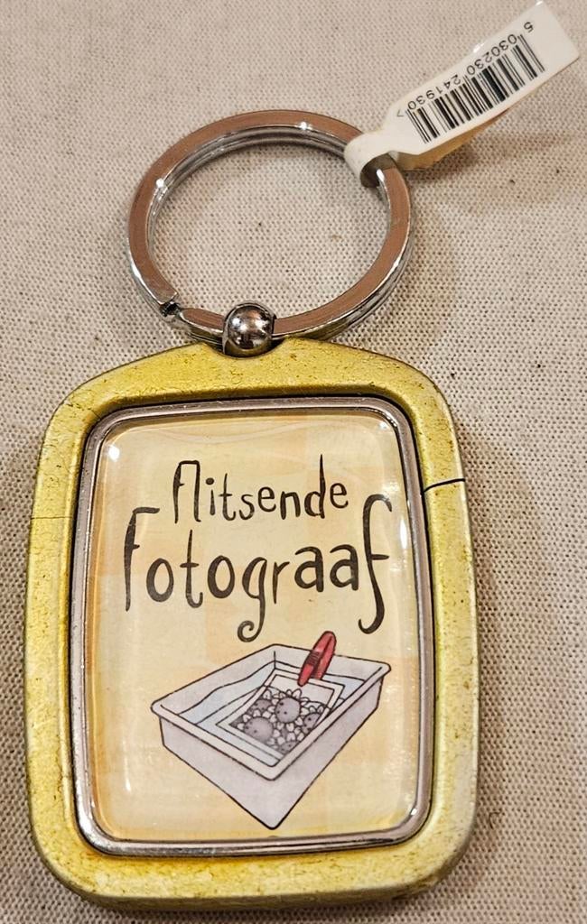 Porte-clés Flashy Photographer NOUVEAU
C'est e, Enlèvement ou Envoi, Comme neuf