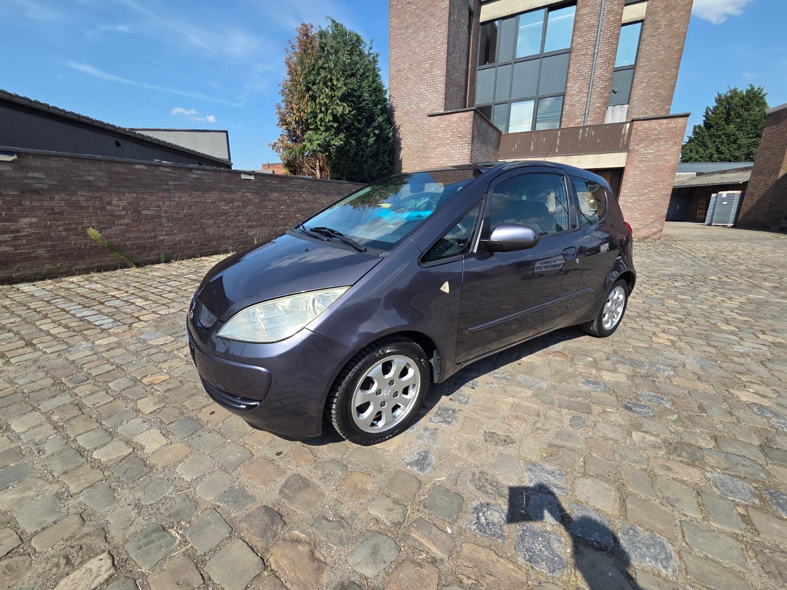 Mitsubishi Colt 1.3i 84.000 klm, Auto's, Mitsubishi, Stof, Zwart, 4 cilinders, Colt