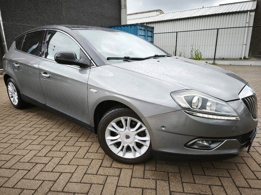 Lancia Delta 1,6JTD Automaat, Auto's, Euro 5, Zwart, 4 cilinders, Leder