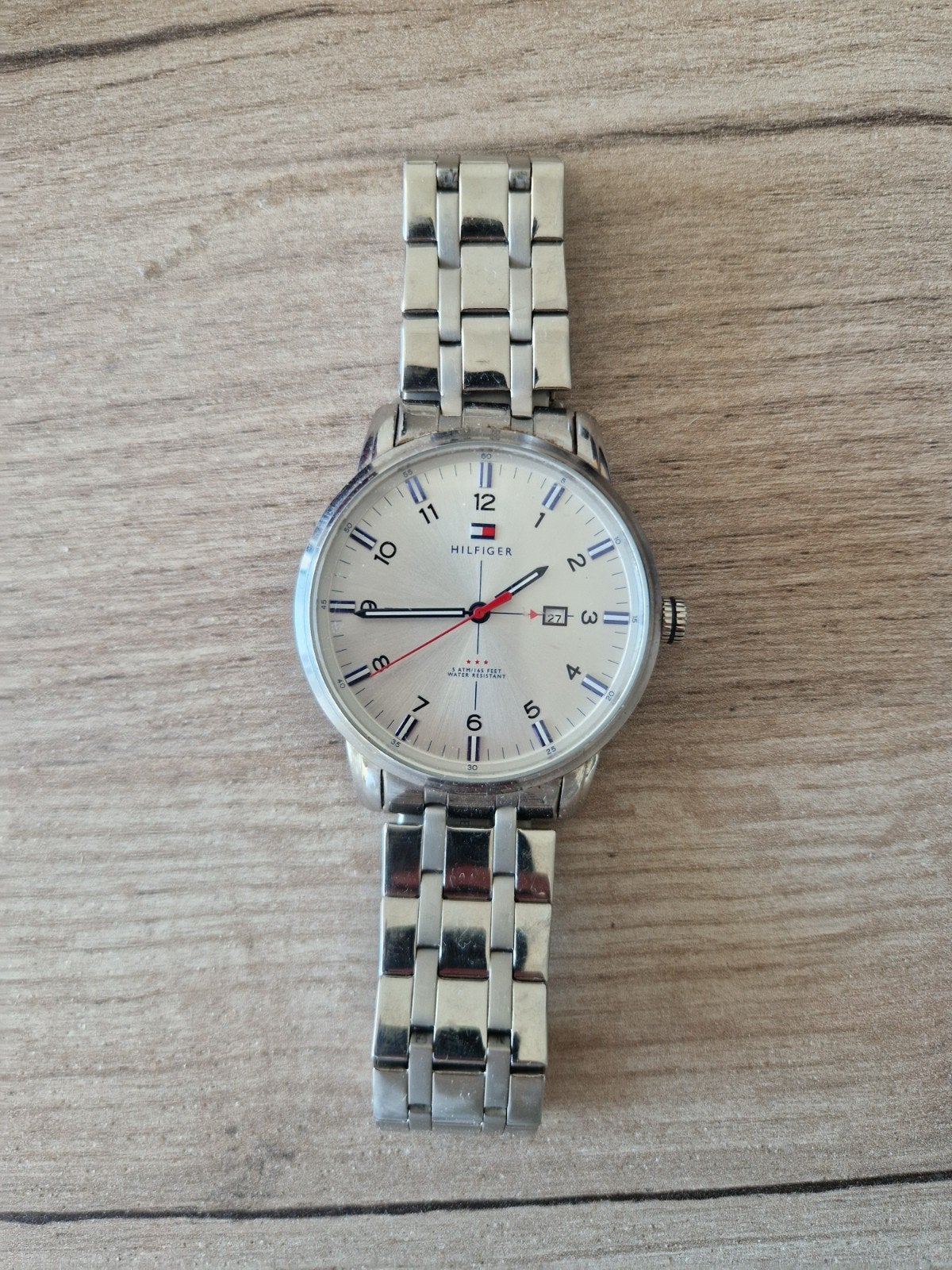Tommy Hilfiger herenhorloge, Ophalen