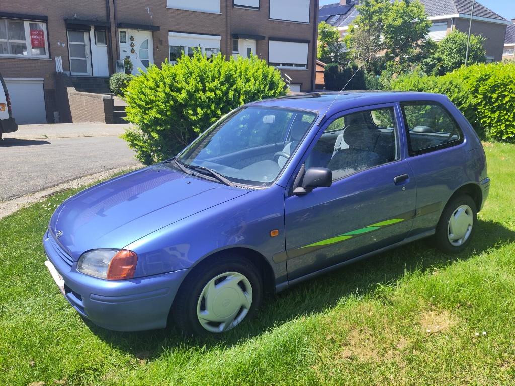 Toyota Starlet - automaat GERESERVEERD, Auto's, Toyota, Stof, 1370 kg, 4 cilinders, Starlet