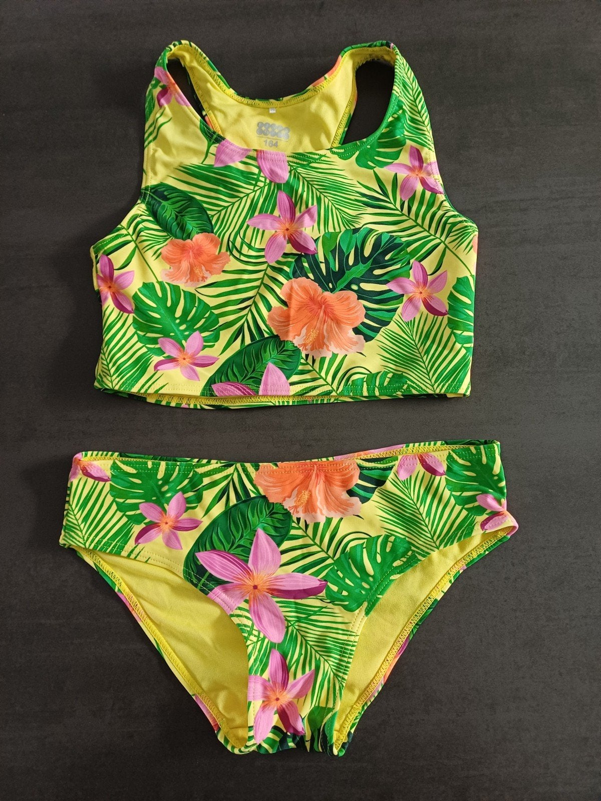 Sportieve bikini met tropische print, Kinderen en Baby's, Bikiniset, Ophalen of Verzenden, Zo goed als nieuw, Maat 164