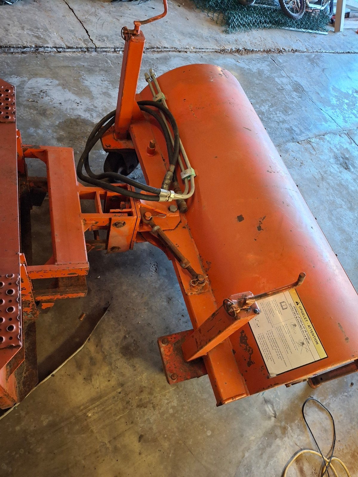 Borstelmachine voor bobcat, Enlèvement