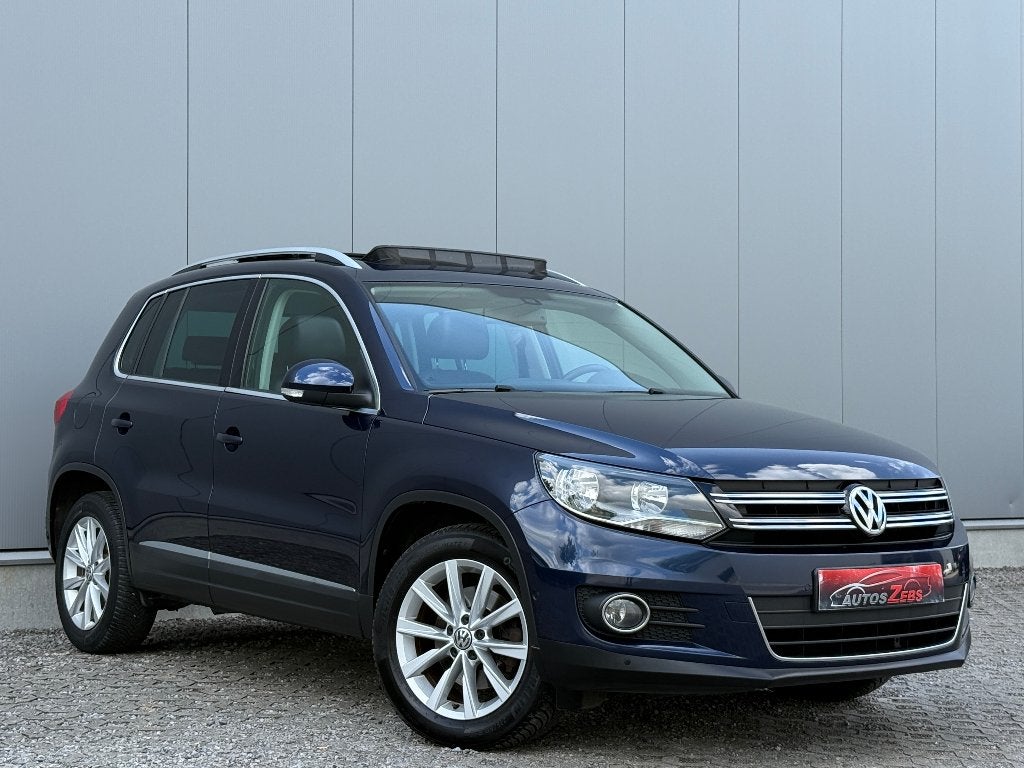 Volkswagen Tiguan 2.0TDi Pano ElekZetel Cruise Navi DigAirco, Auto's, Voorwielaandrijving, Euro 5, Zwart, 4 cilinders