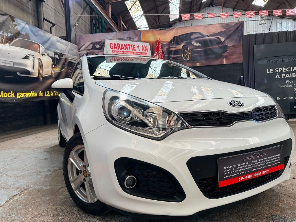 Kia Rio 1.2i Airco J.A., Auto's, Kia, Euro 5, 63 kW, Wit, Leder