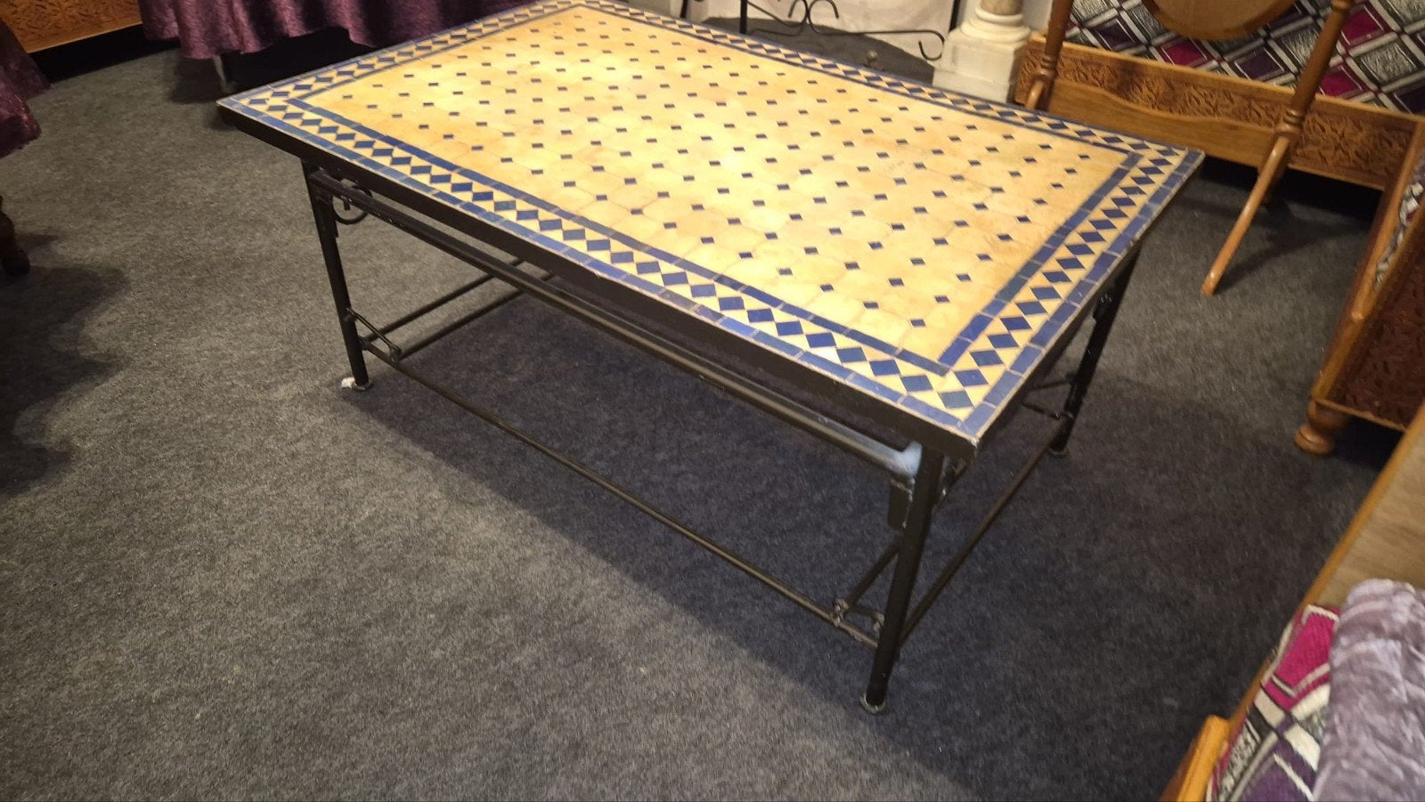 Marmeren tafel en smeedijzeren voet, Ophalen