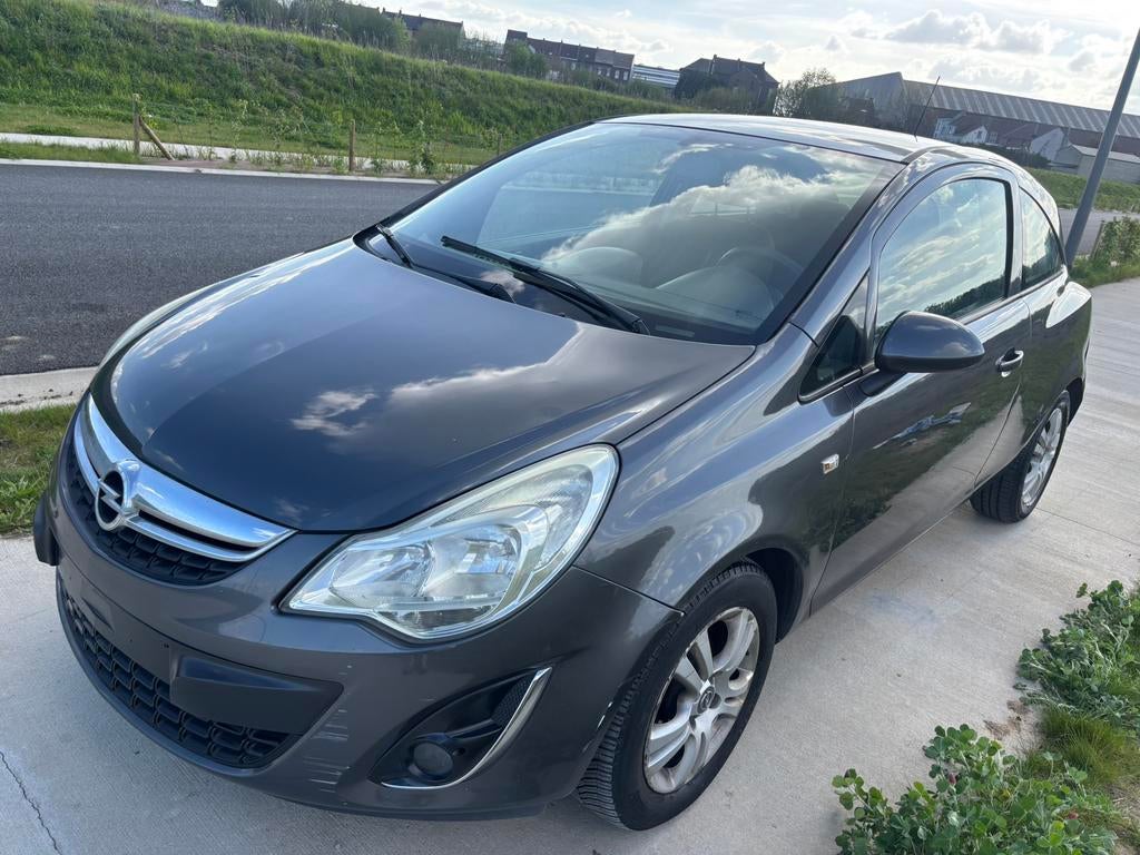 Opel Corsa 1.2i Essence année 2013 Euro 5 avec airco, Auto's, Stof, Zwart, 4 cilinders, Bedrijf