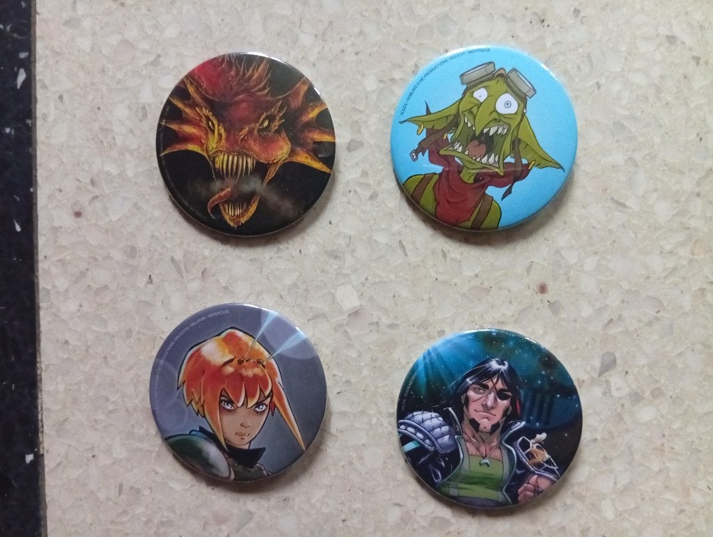 4 badges BD (Vente à la pièce ou en lot)., Enlèvement ou Envoi, Autres personnages, Neuf, Image, Affiche ou Autocollant