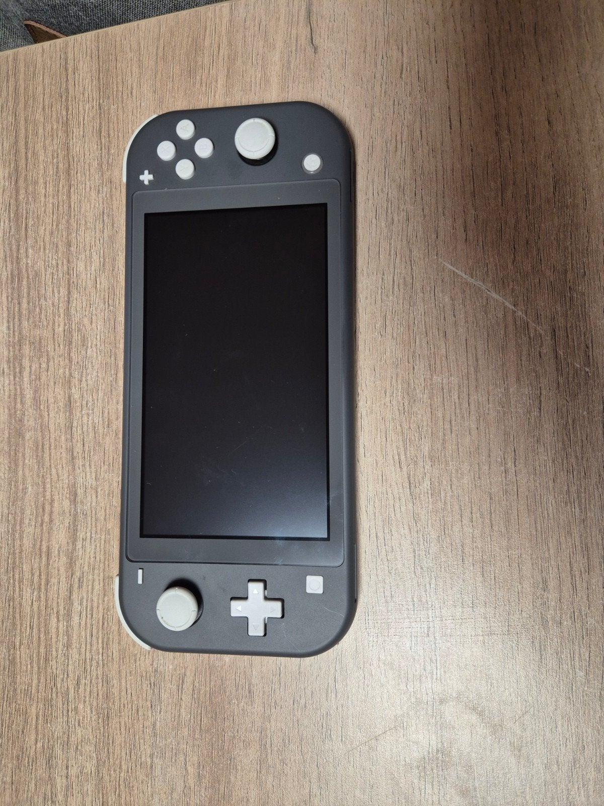 nintendo switch lite, Ophalen of Verzenden, Grijs, Zo goed als nieuw, Met beschermhoes of tas