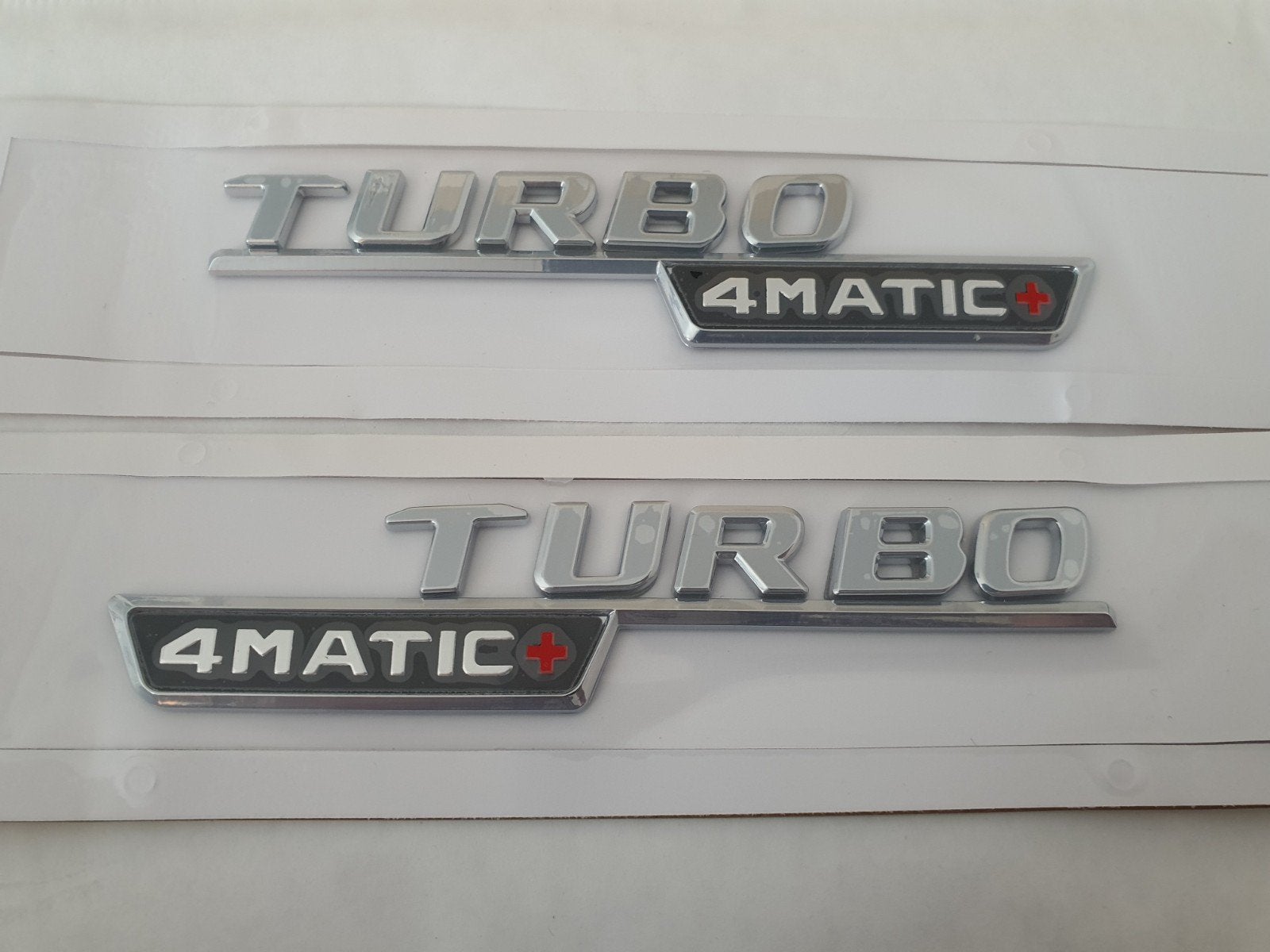 Mercedes Turbo 4matic+ zijkant logo's in zilver of zwart, Nieuw, Ophalen of Verzenden, Spatbord, Links