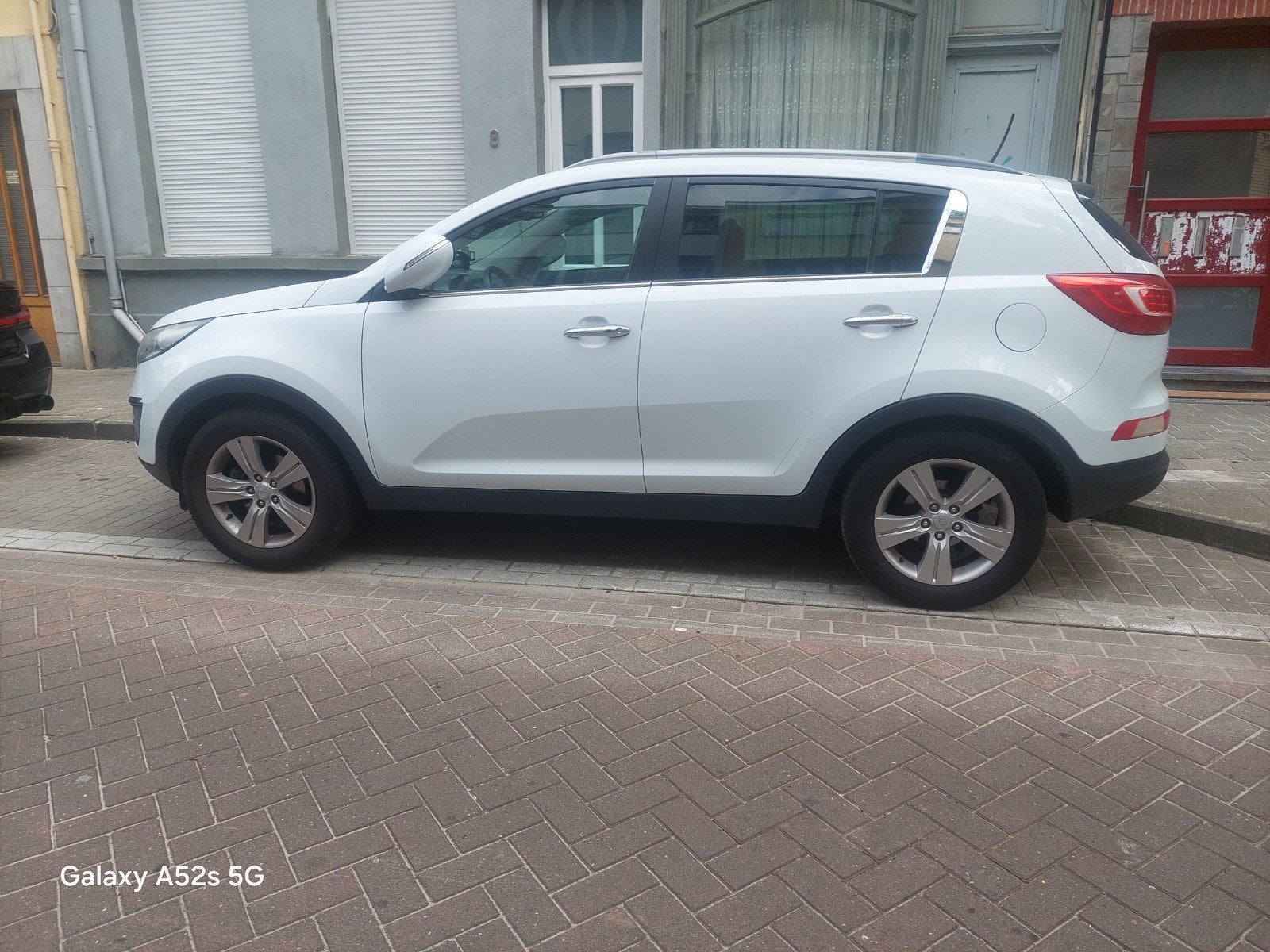 kia sportage, Auto's, Voorwielaandrijving, Euro 5, Zwart, Handgeschakeld