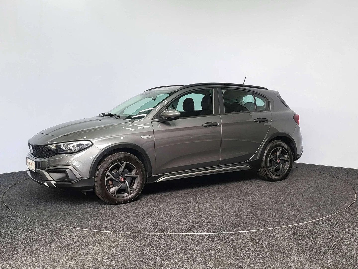 Fiat Tipo Cross 1.5 Hybrid Red | 2022 | 61.738 km | Automaat, Auto's, Fiat, Automaat, Stof, Gebruikt, Zwart
