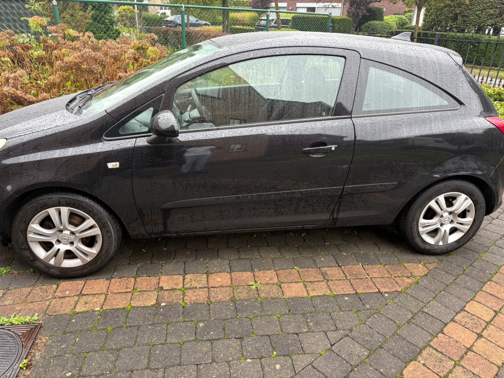 Opel corsa D 1.2 benzine te koop, Auto's, Stof, Zwart, 4 cilinders, Zwart