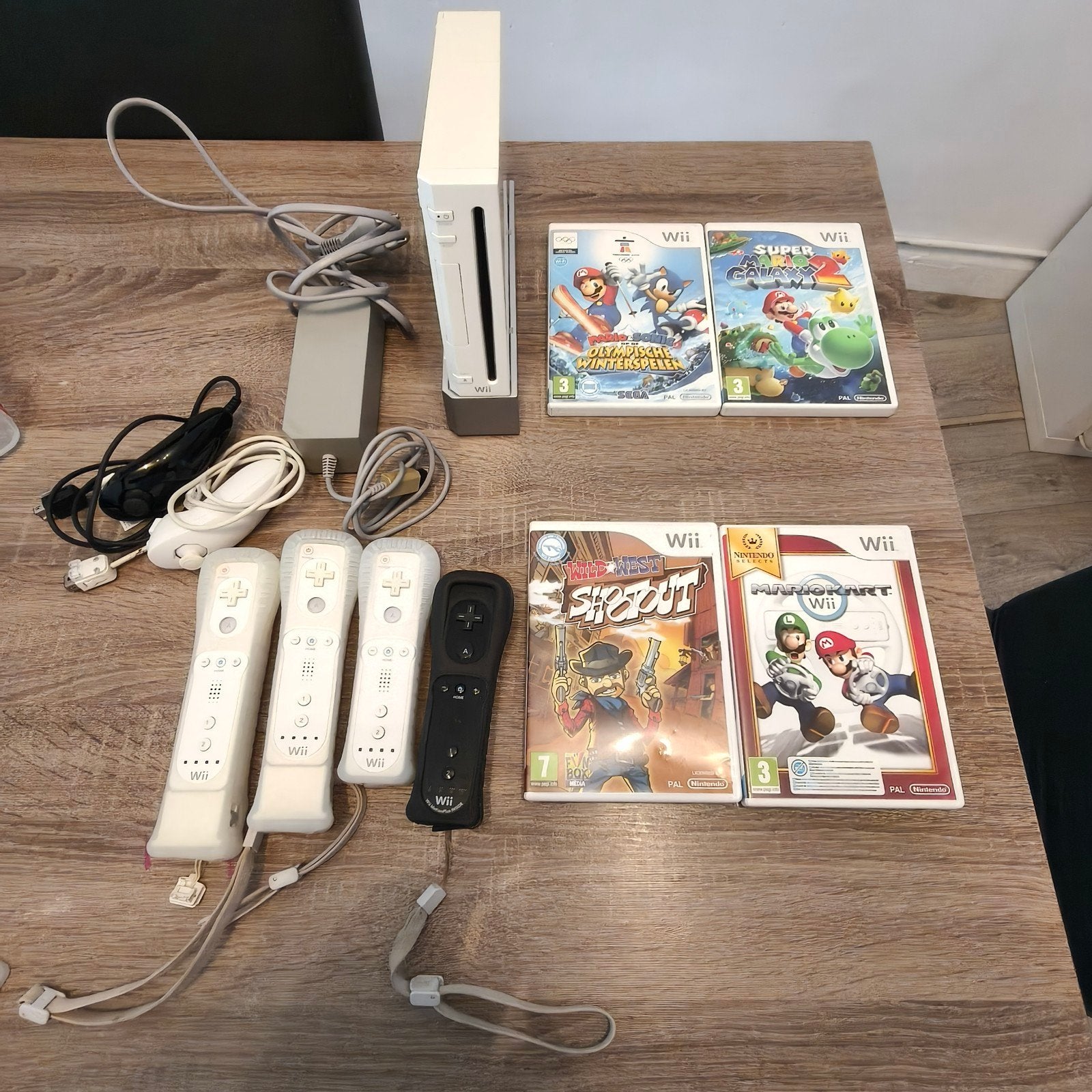 Nintendo Wii set in goede staat met 5 games mario 3×!!!, Ophalen