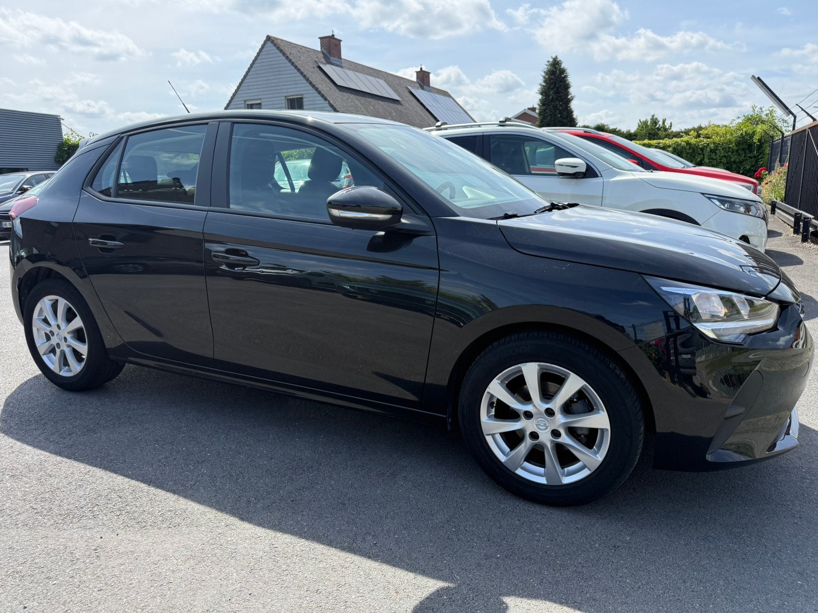 Opel Corsa 1.2i/9.500 + BTW/CARPLAY/STUURVERWARMING/CAMERA, Auto's, Opel, Voorwielaandrijving, Stof, 1199 cc, Zwart