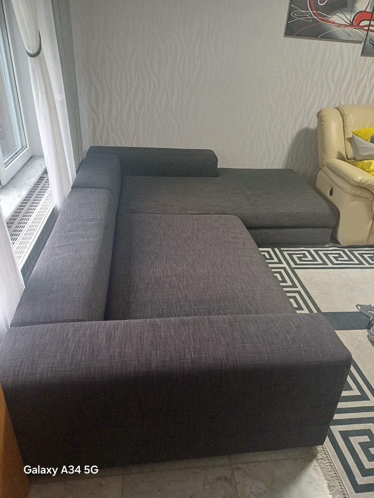 Grijze hoekzetel te koop, Ophalen