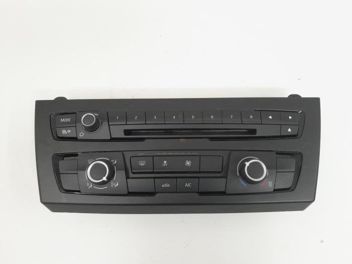 Panneau de commandes chauffage d'un BMW 1-Serie, -, 3 mois de garantie, Utilisé, -