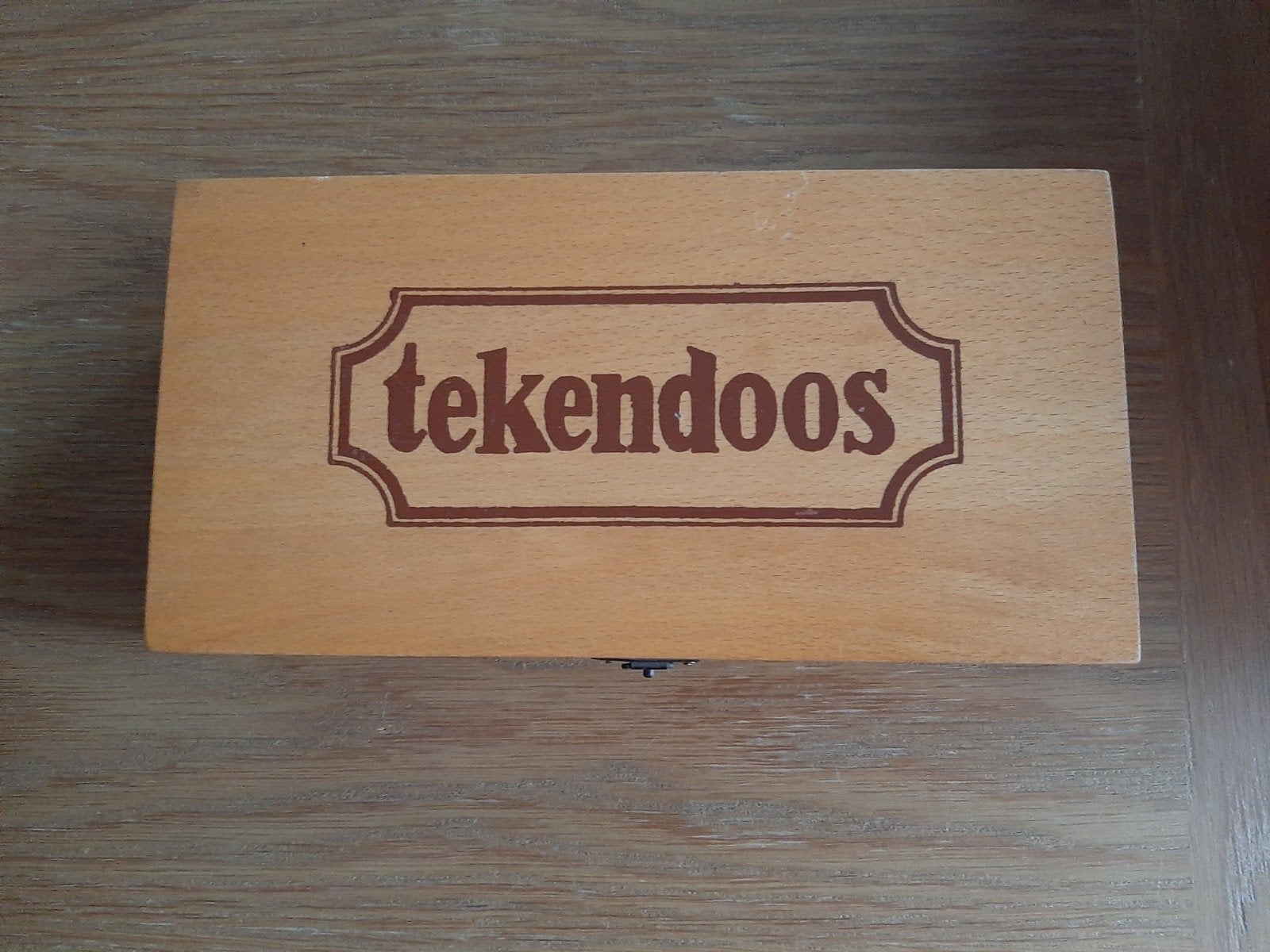 Houten opbergdoos tekenmateriaal, Ophalen