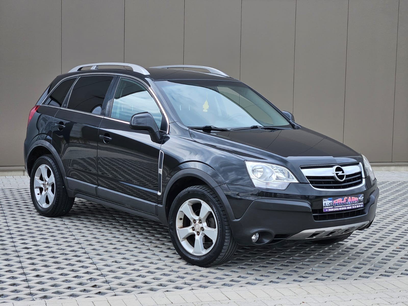 Opel andara 2.0 diesel, Auto's, Opel, Voorwielaandrijving, Euro 5, Stof, Zwart