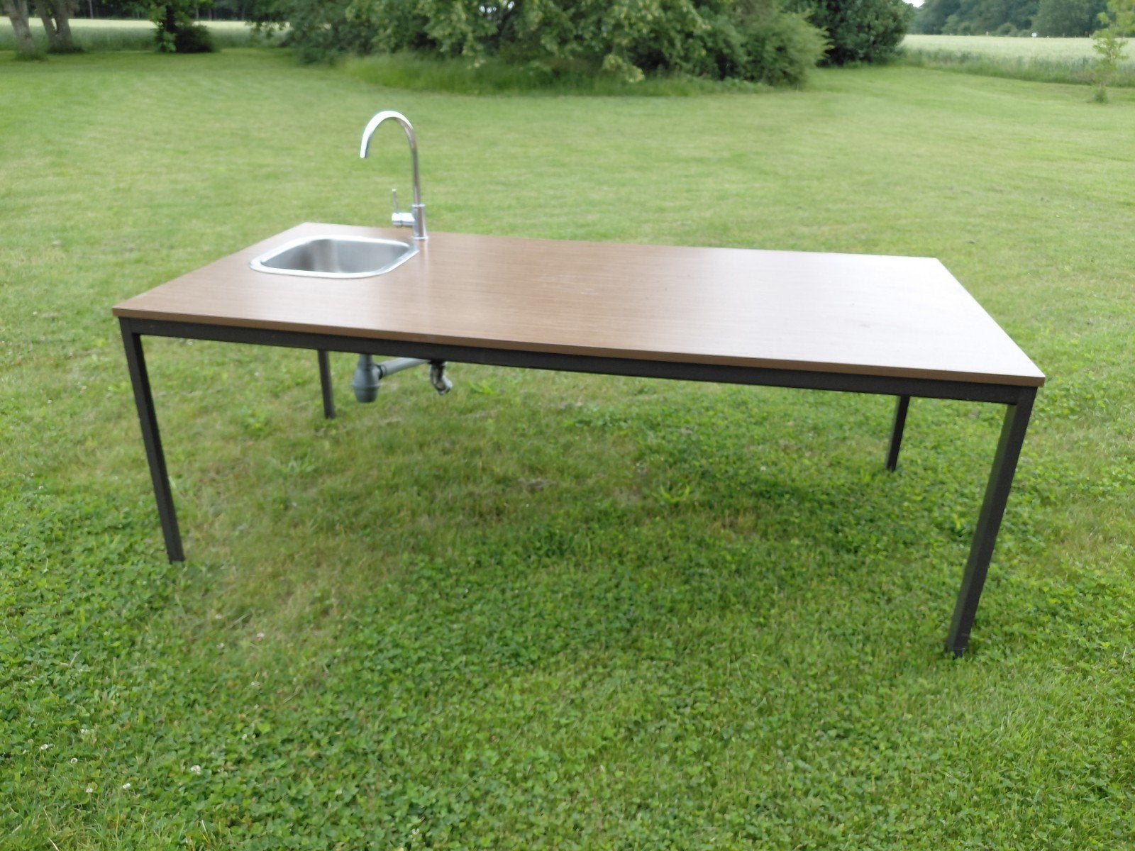 Tafel met afwasbak en kraan en afloop, Ophalen