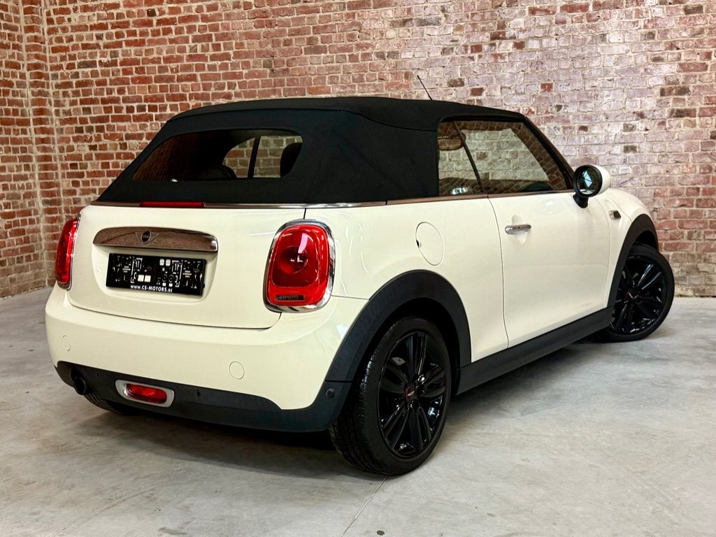 Prachtige MINI One 1.2i Cabrio met garantie!, Auto's, Mini, Voorwielaandrijving, Stof, Cabriolet, 1198 cc